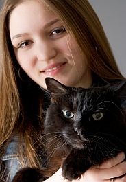 Girl holding cat
